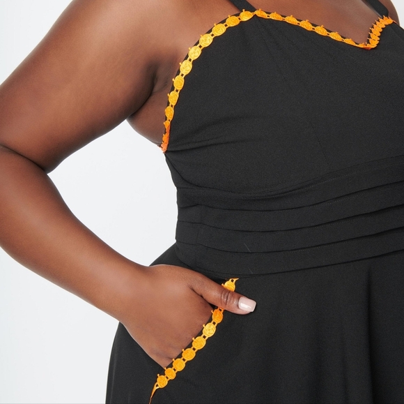 Black fit and flare dress with pumpkin trim - Picture 3 of 6